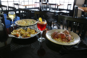 Nikolas Pizza, pasta, meatballs, sausage, spaghetti, garlic bread, wine